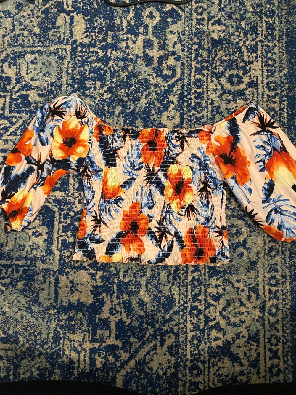 Love By Design Off-Shoulder Floral Smocked Crop Top in Orange and Blue